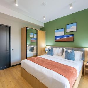 Suite "Premium" met een Slaapkamer en een King Size Bed